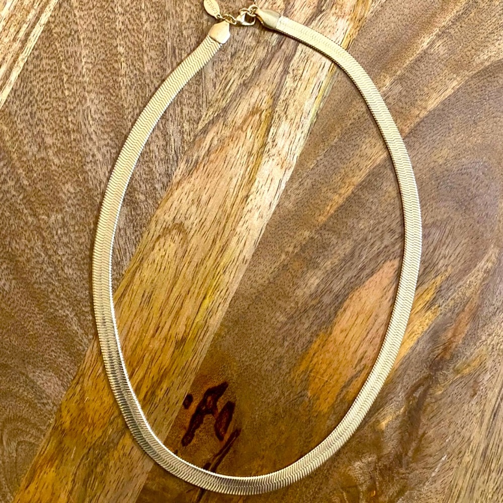 Gold necklace.
